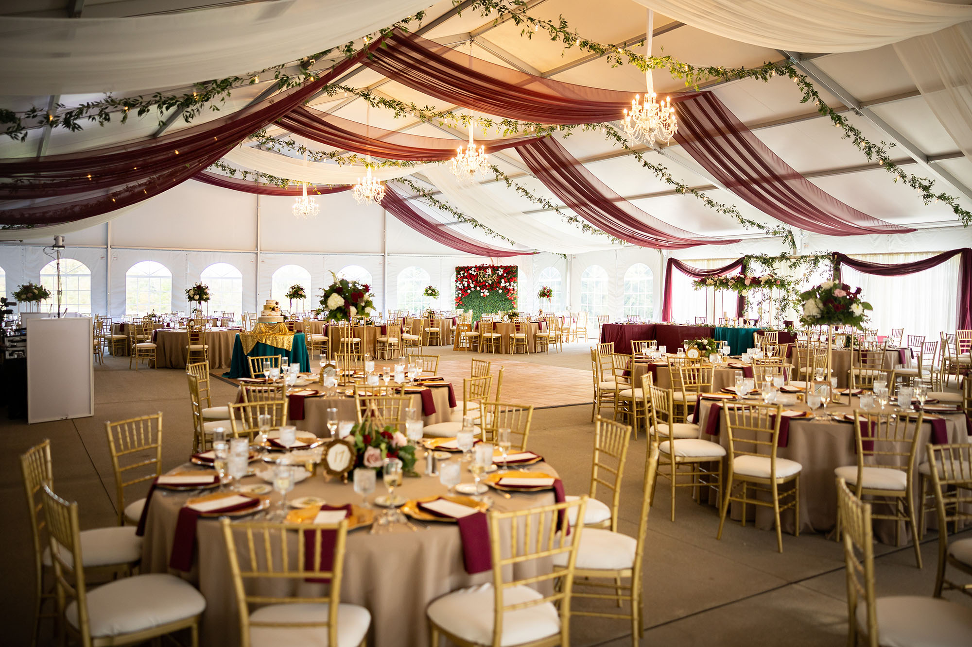 Burgundy & Ivory Draping w/ Greenery Covered Bistro Lighting - Linden Hall