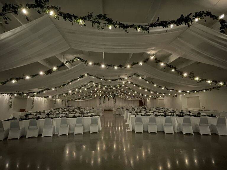 Lush greenery-inspired wedding decor and lighting by ILLUME at the North Side Sportsmen’s Association in Warrendale, PA.