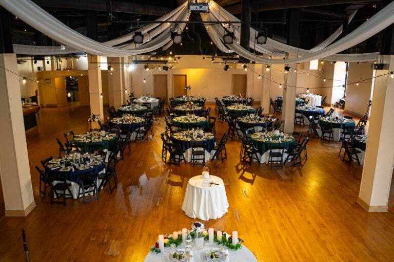 Grand ballroom wedding transformation by ILLUME at the historic Capitol Theatre in Wheeling, West Virginia, featuring custom event lighting and production.