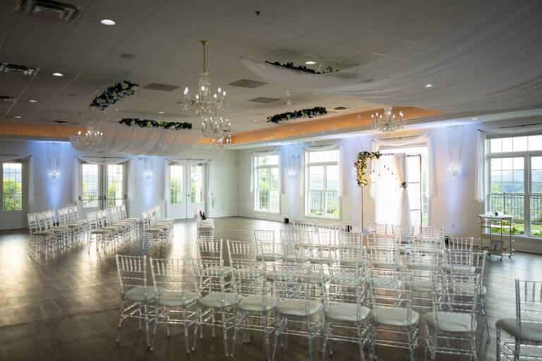 Custom wedding ceremony backdrop and elegant ceiling draping installation by ILLUME at Twelve Oaks Mansion in Mars, PA.