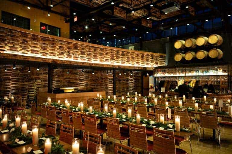 Warm white uplighting at City Winery Pittsburgh by ILLUME, located in the historic Terminal Building in the Strip District.