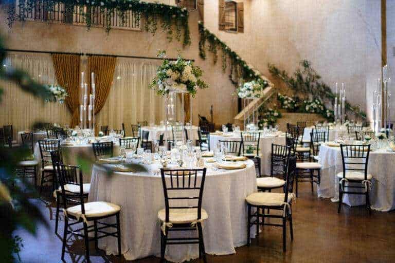 Tuscan-inspired greenery and white floral installations by ILLUME for a wedding at Bella Sera in Canonsburg, PA, near Pittsburgh.